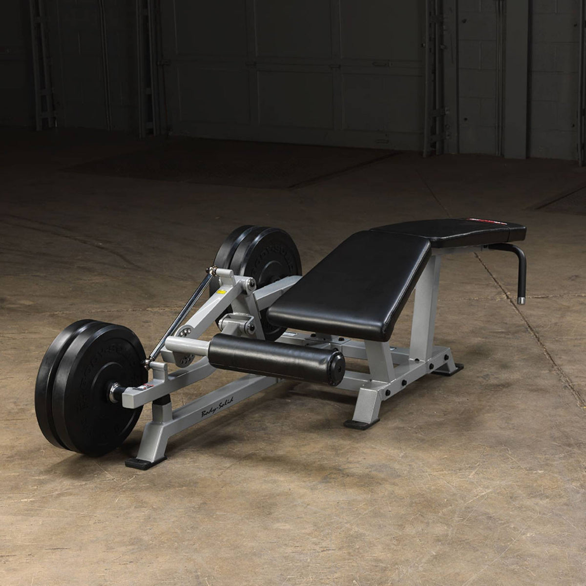 Body-Solid Pro ClubLine Leverage Leg Curl LVLC Machine Backview with weight plates added