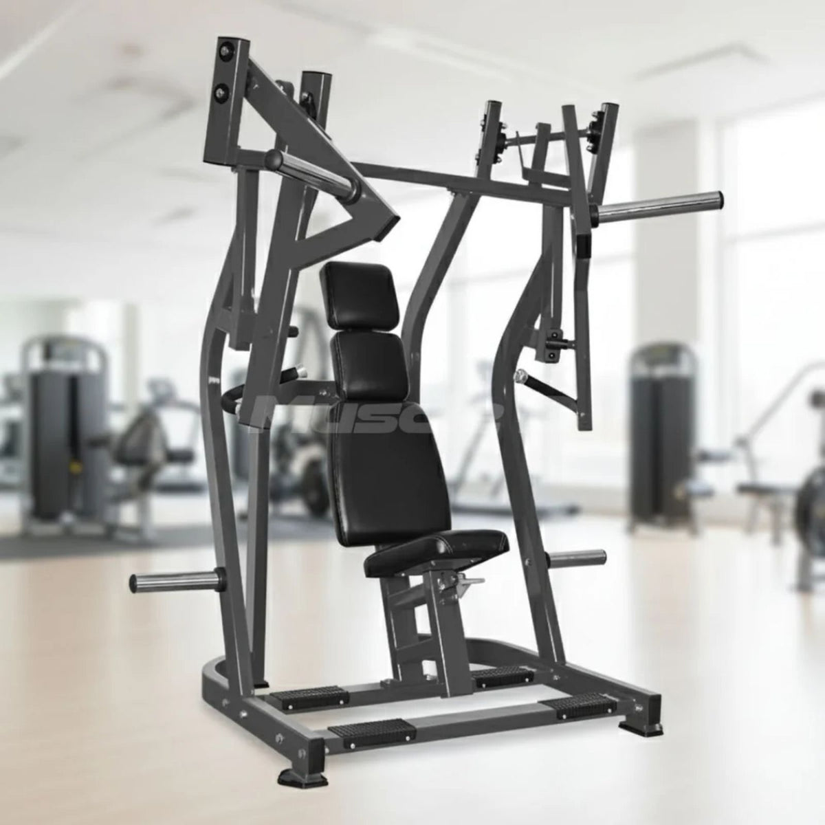 Excel Iso-Lateral Bench Press - Muscle D Fitness - Plate Loaded Chest Press machine with a blurred gym background