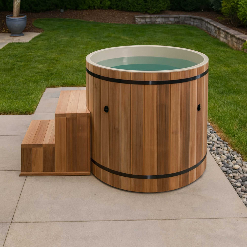 Wooden hot tub with steps on a patio area
