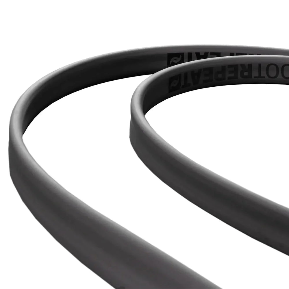 Close-up of a black belt with 'MotorPace' branding on a white background