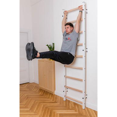BenchK Wall Bar 700W with user exercising leg lifts