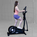 Best Fitness Cross Trainer Elliptical BFCT1B Side view of woman pedaling on Best Fitness CT1 elliptical machine during home gym workout.

