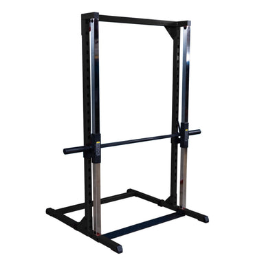 Best Fitness Smith Machine BFSM250B  Body-Solid Smith machine with barbell set in safety position on polished chrome rails in gym