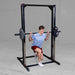 Best Fitness Smith Machine BFSM250B Man performing barbell lunge exercise using Body-Solid Smith machine for controlled movement.