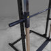 Best Fitness Smith Machine BFSM250B Side detail of smooth chrome guide rails and bar catch mechanism on Body-Solid Smith machine.