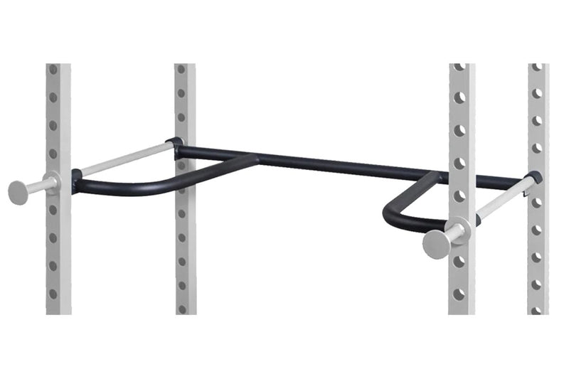 A black dip bar attachment mounted horizontally between the interior of a power rack verticals, shown against a plain white background.