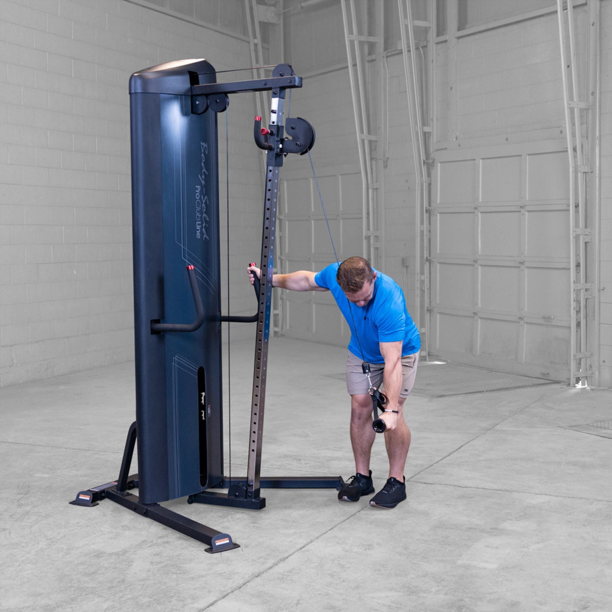 Body-Solid-S2CC-Series-2-Cable-Column-Single-Arm-Cable-Rear-Delt-Raise. Man exercising. 