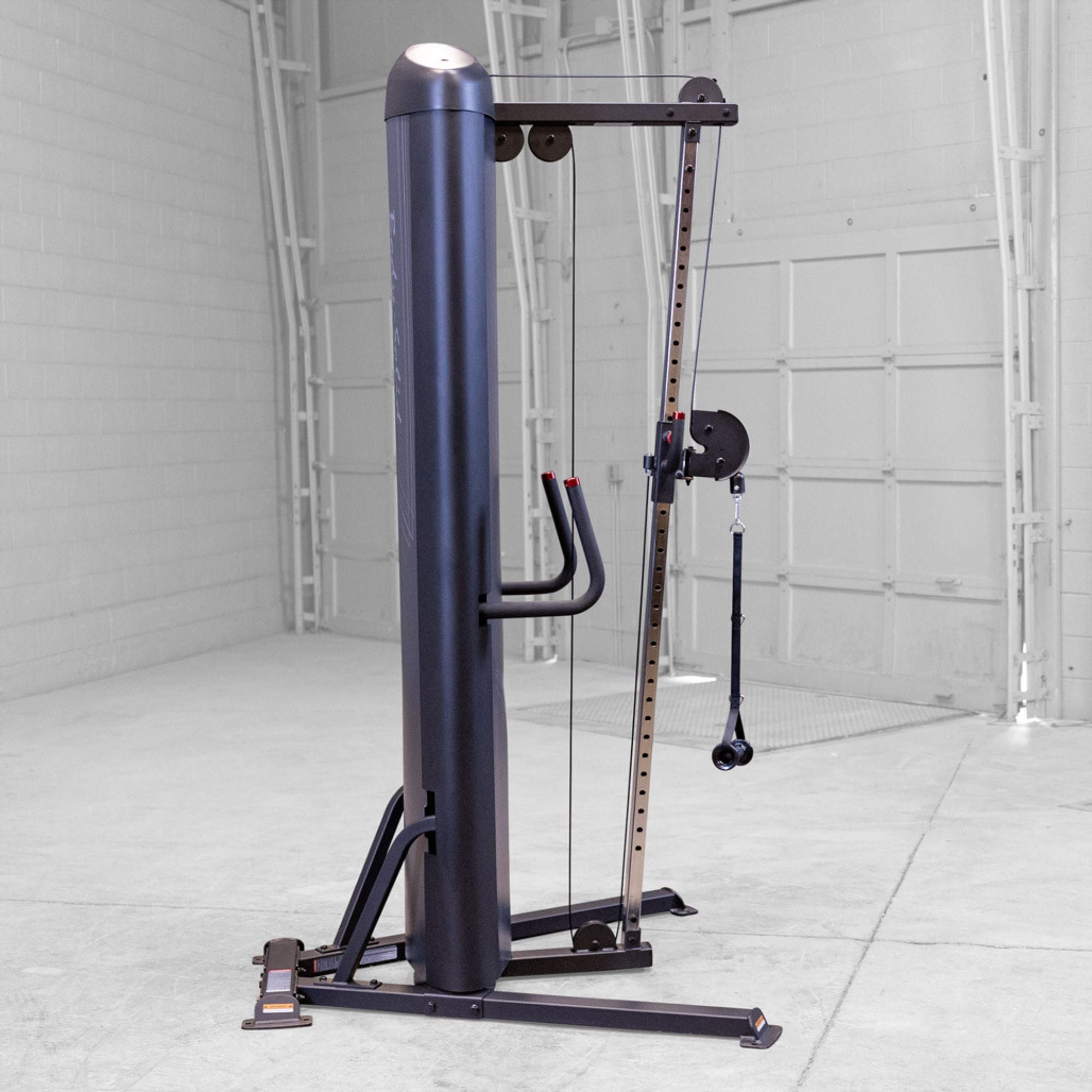 Body-Solid-S2CC-Series-2-Cable-Column-in-garage-profile-view. Gym machine in a white room