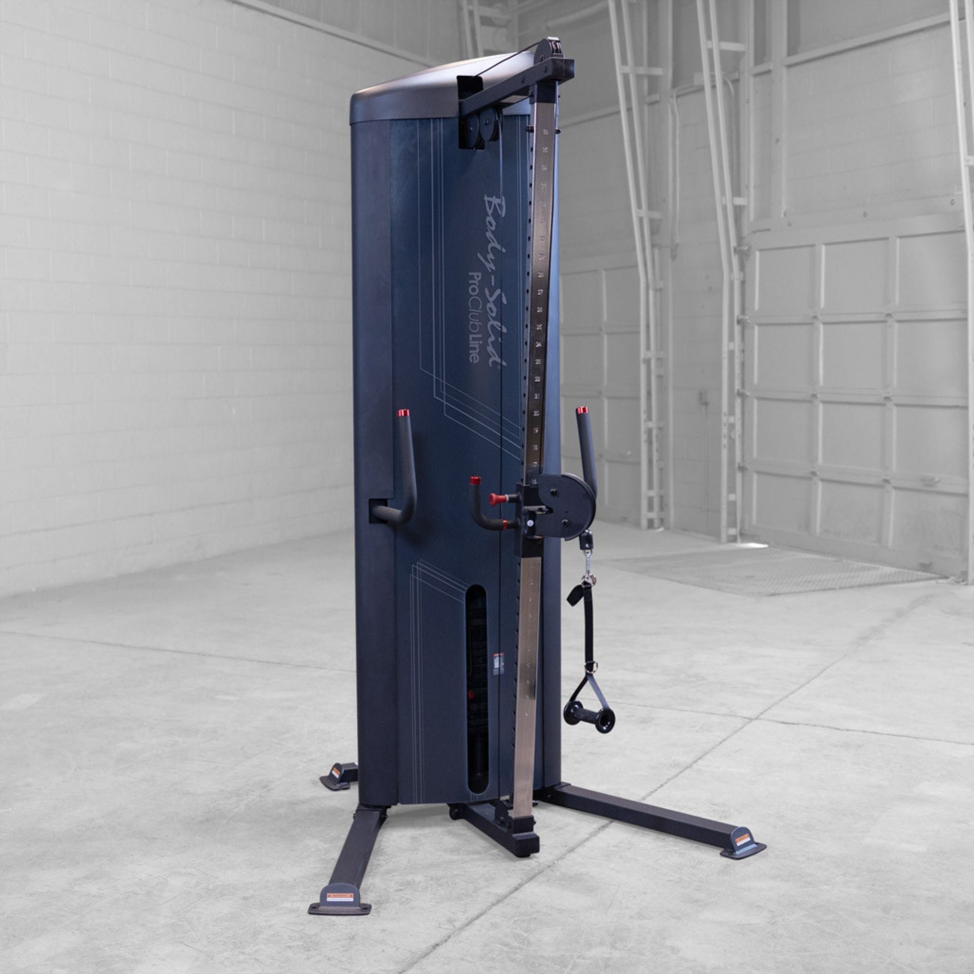 Body-Solid-S2CC-Series-2-Cable-Column-in-garage. Blue cable machine in a gym setting