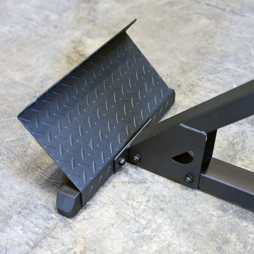 Body-Solid 45 Back Hyperextension GHYP345B Close-up of diamond plate footplate of  hyperextension bench