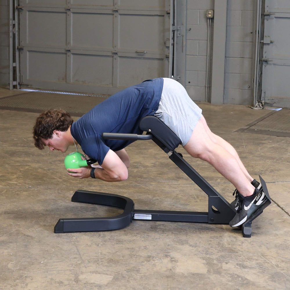 Body-Solid 45 Back Hyperextension GHYP345B Padded support and handlebar section of hyperextension bench with logo visible