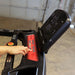 Body-Solid Best Fitness Folding Treadmill With LED Console BFT25 Close-up of user adjusting Best Fitness treadmill control panel settings