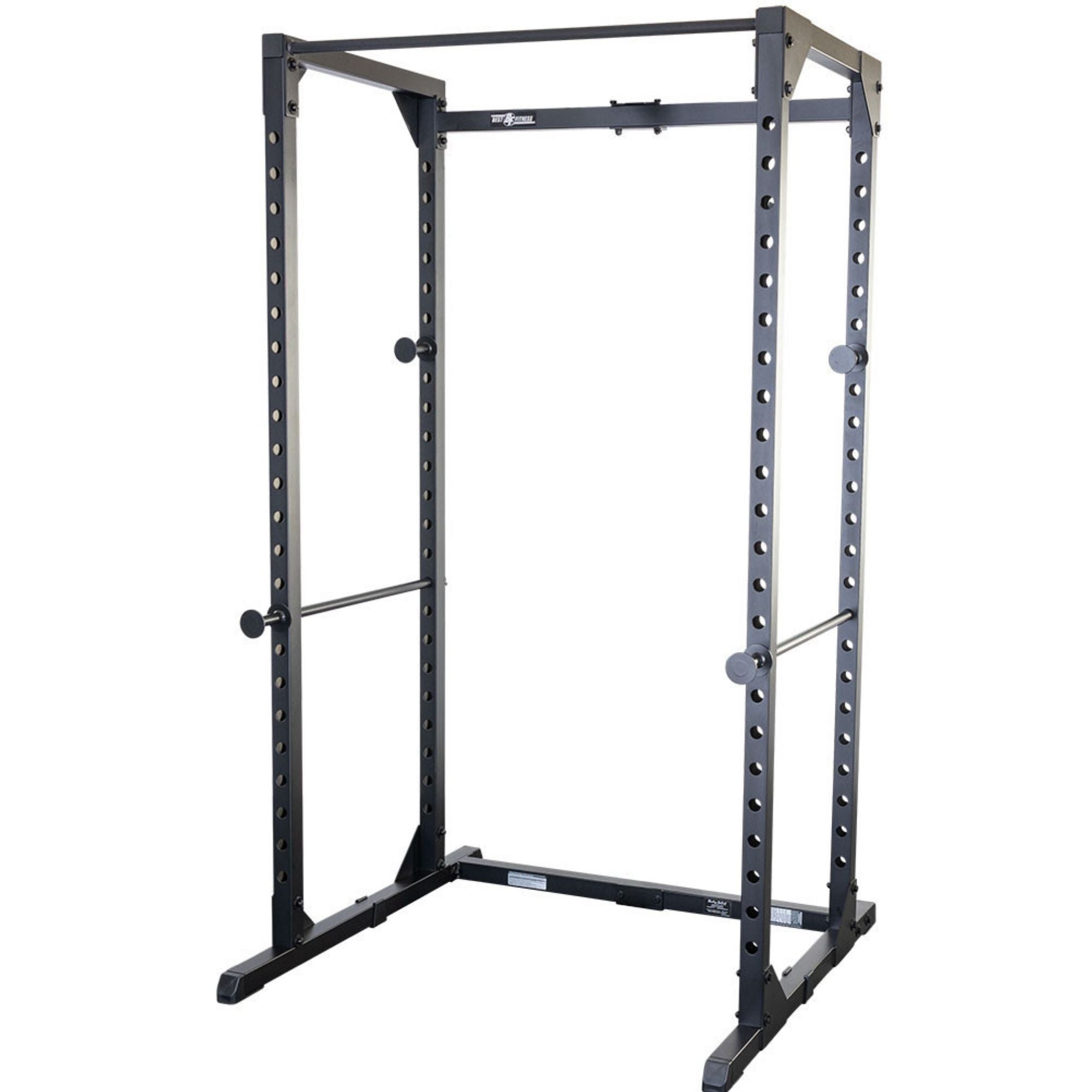 Body-Solid Best Fitness Power Rack BFPR100B Black steel power rack with multiple adjustment holes, safety bars, and chin-up bar for home or commercial gym setups.