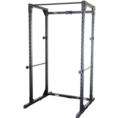 Body-Solid Best Fitness Power Rack BFPR100B Black steel power rack with multiple adjustment holes, safety bars, and chin-up bar for home or commercial gym setups.
