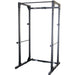 Body-Solid Best Fitness Power Rack BFPR100B Black steel power rack with multiple adjustment holes, safety bars, and chin-up bar for home or commercial gym setups.