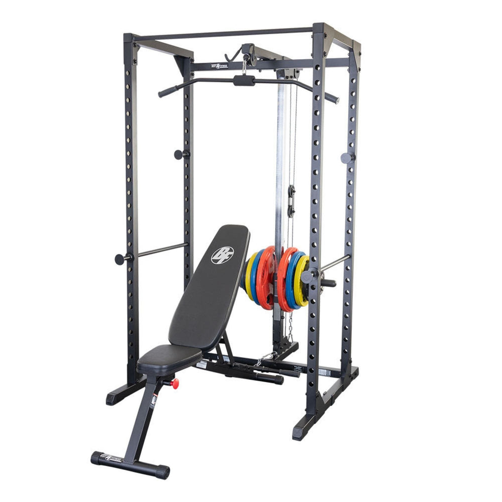 Body-Solid Best Fitness Power Rack BFPR100B Power rack setup with adjustable bench, cable pulley, and colorful weight plates neatly organized