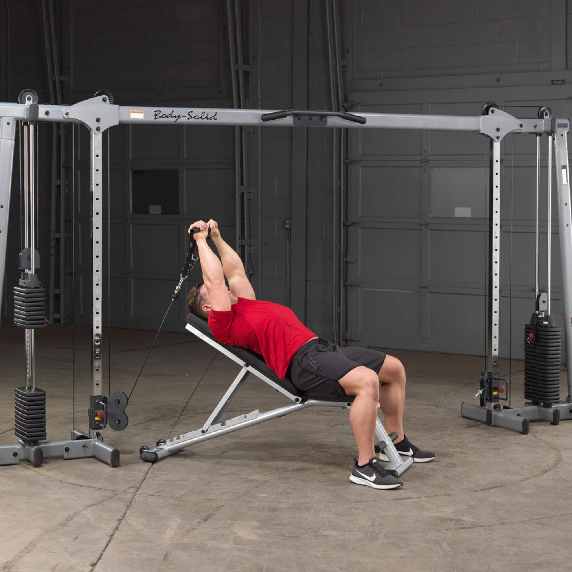 Body-Solid Cable Crossover GDCC250B Incline bench triceps extension on  dual cable crossover machine