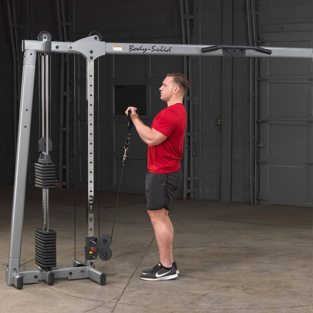 Body-Solid Cable Crossover GDCC250B Standing bicep cable curls using