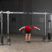 Body-Solid Cable Crossover GDCC250B used for bent-over rear delt fly cable exercise