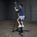 Body-Solid Climber Endurance CL300 Man performing cardio workout 