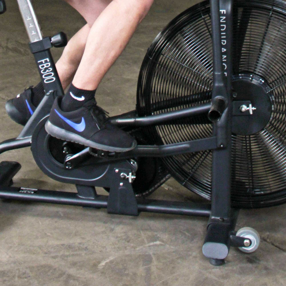 Body-Solid Endurance Dual Action Fan Bike FB300B Close-up of FB300 bike pedal and crank system in motion