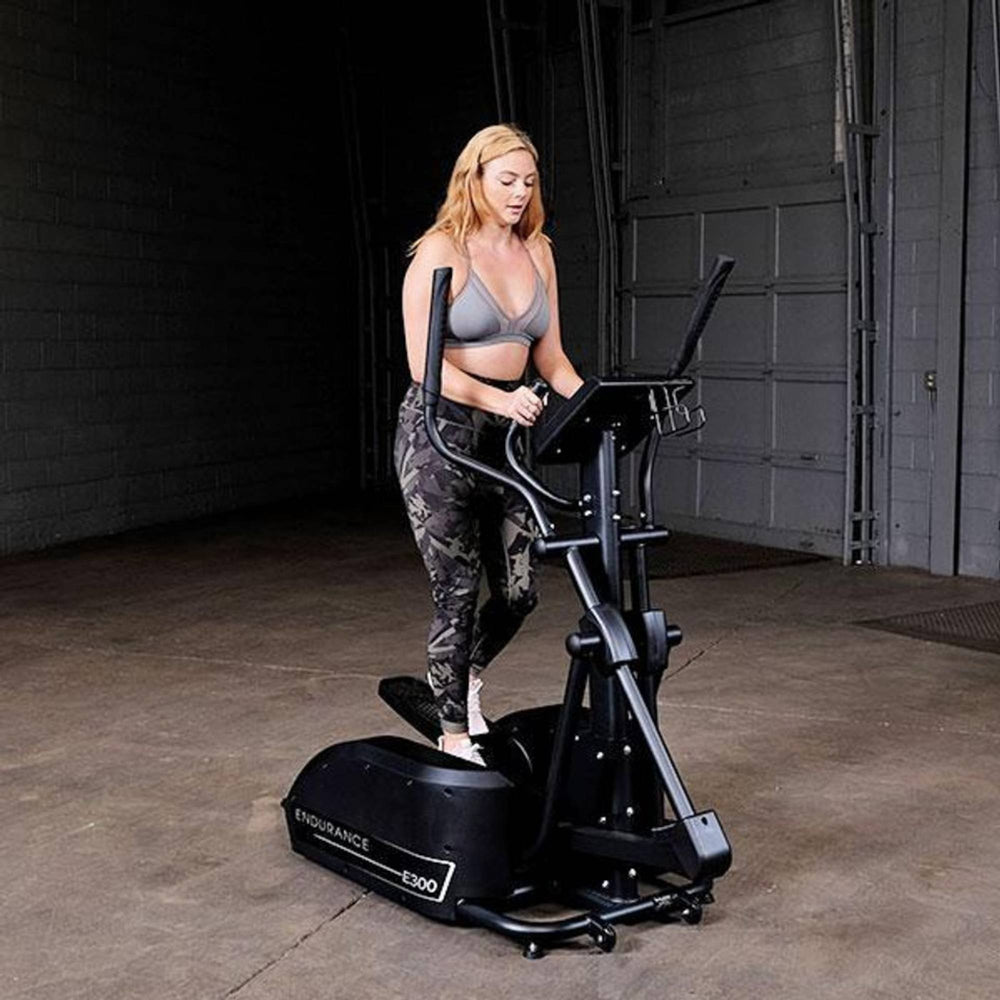 Body-Solid Endurance E300 Center Drive Elliptical Trainer E300 for a low-impact cardio workout
