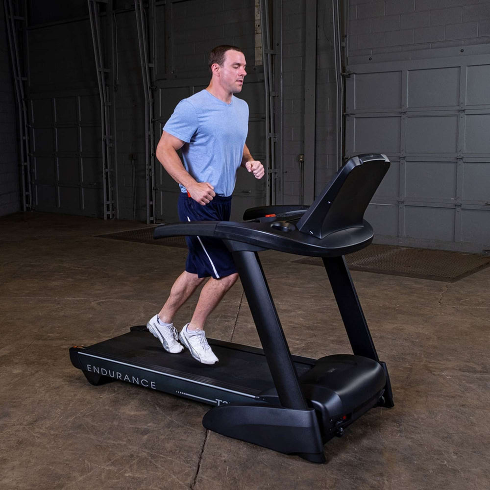 Body-Solid Endurance T25 Folding Treadmill T25 a man exercising 