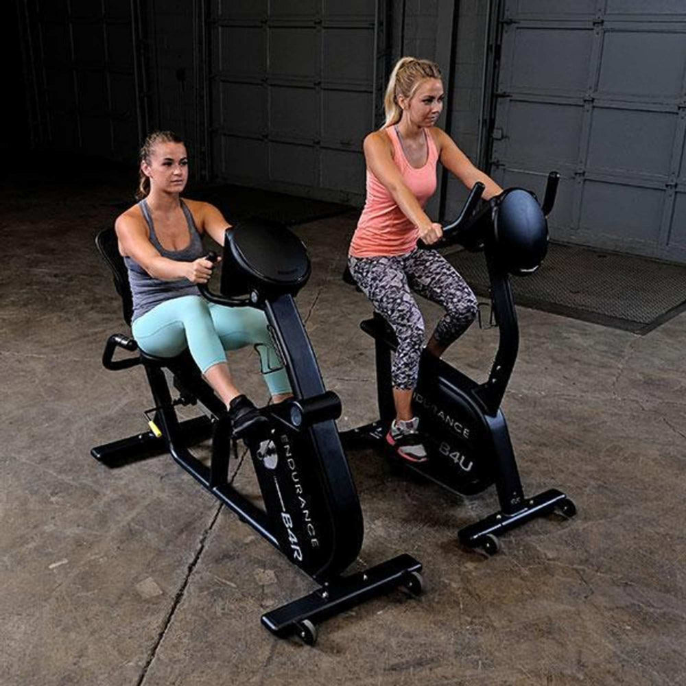 Body-Solid Endurance Upright Bike B4UB a person performing 