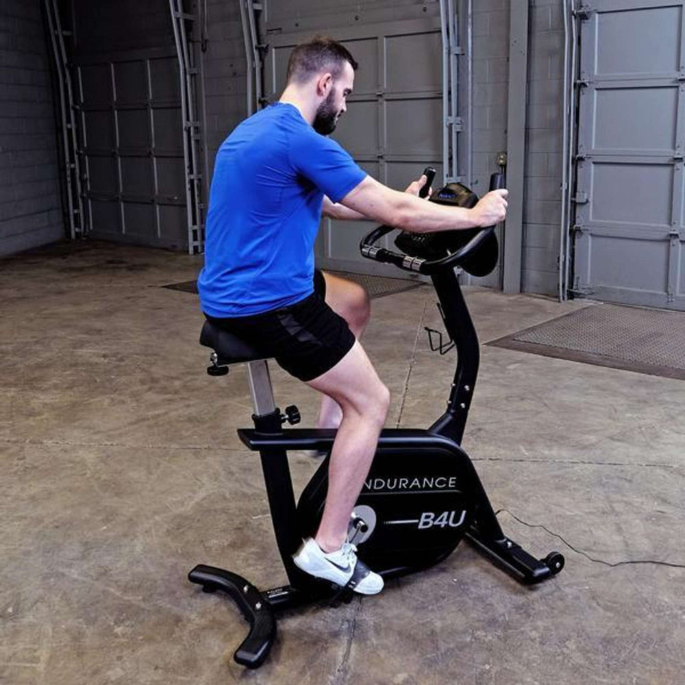 Body-Solid Endurance Upright Bike B4UB a person performing