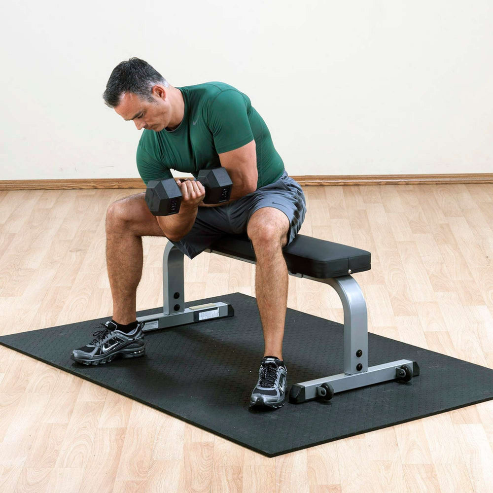Body-Solid Flat Bench GFB350B Man performing