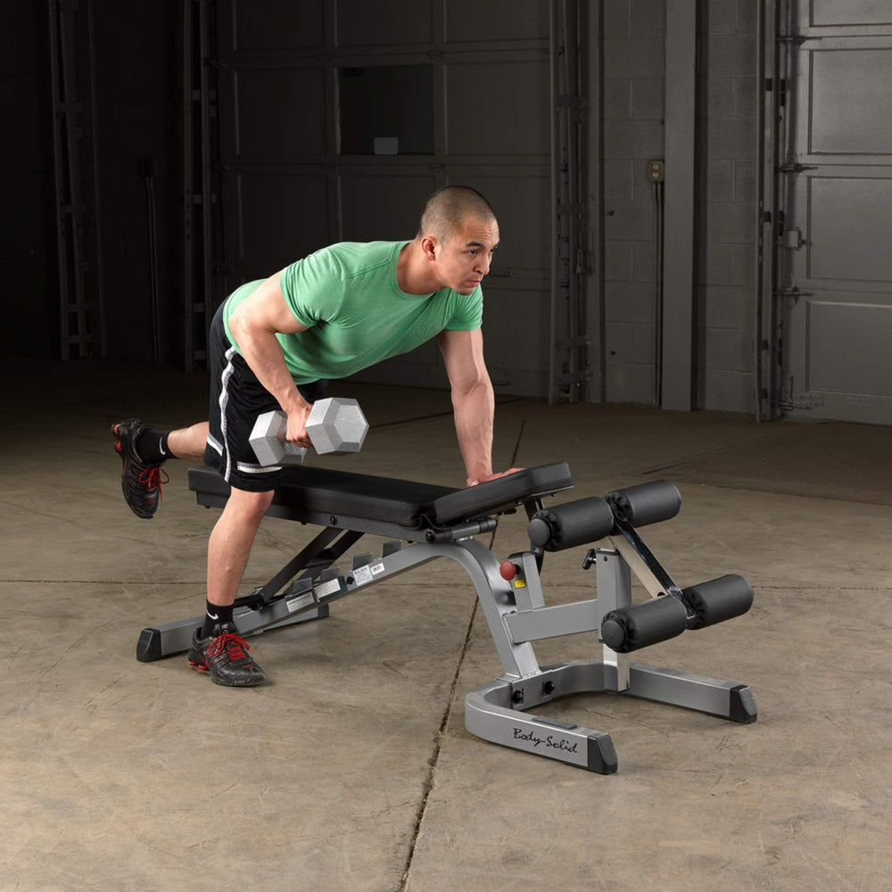 Body-Solid Flat Incline Decline Bench GFID71B Man doing one-arm dumbbell row on flat Body-Solid bench