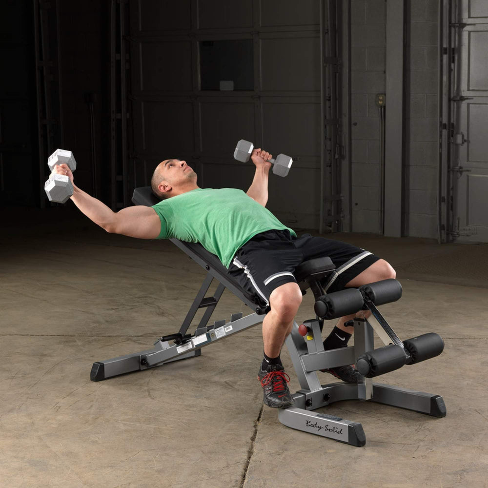 Body-Solid Flat Incline Decline Bench GFID71B Man performing incline dumbbell fly on Body-Solid incline bench