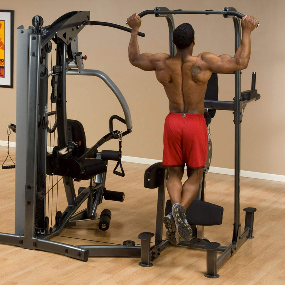 Body-Solid Fusion Weight Assist Chin and Dip Attachment FCDWA  user performing