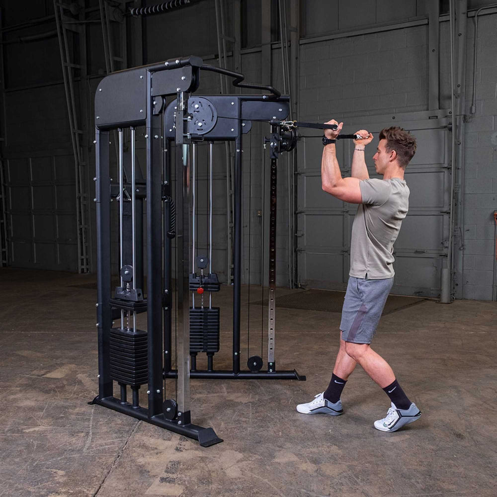Body-Solid GFT100 Functional Trainer GFT100 performing an upper-body cable exercise