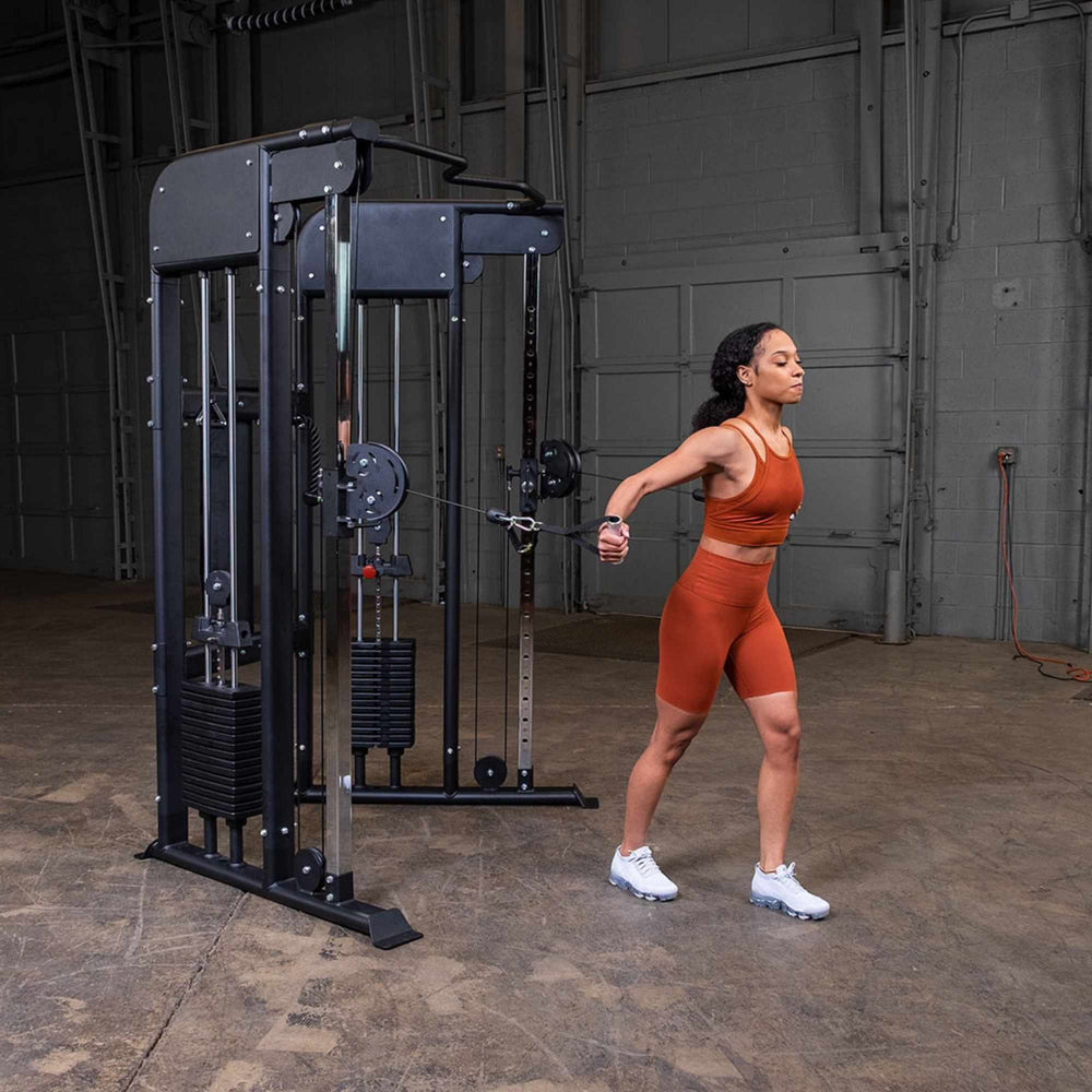 Body-Solid GFT100 Functional Trainer GFT100 user performing chest fly