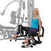 Body-Solid Inner-Outer Thigh Attachment for the G9S GIOT9 Woman performing seated inner thigh exercise