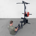 Body-Solid Lat Machine With Weight Stack GLM85B Man doing seated low rows 
