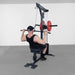 Body-Solid Lat Machine With Weight Stack GLM85B Man performing lat pulldown on lat machine with weight stack