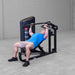 Body-Solid PCL2 Multi Press S2MPX Man performing an incline bench press on the same multifunction gym machine