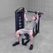 Body-Solid PCL2 Multi Press S2MPX Man pressing upward on incline machine handles in a gym environment