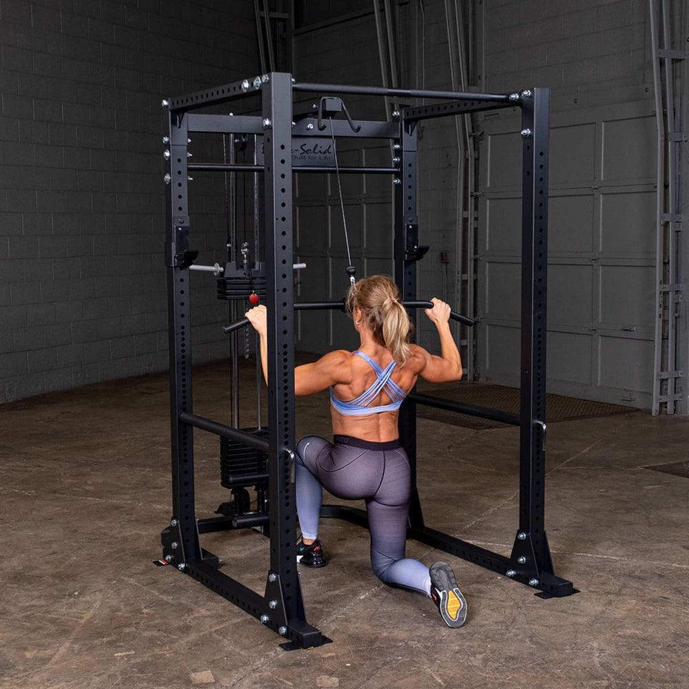 Body-Solid Power Rack Lat Attachment GLA400  a person using a lat attachment seat extension