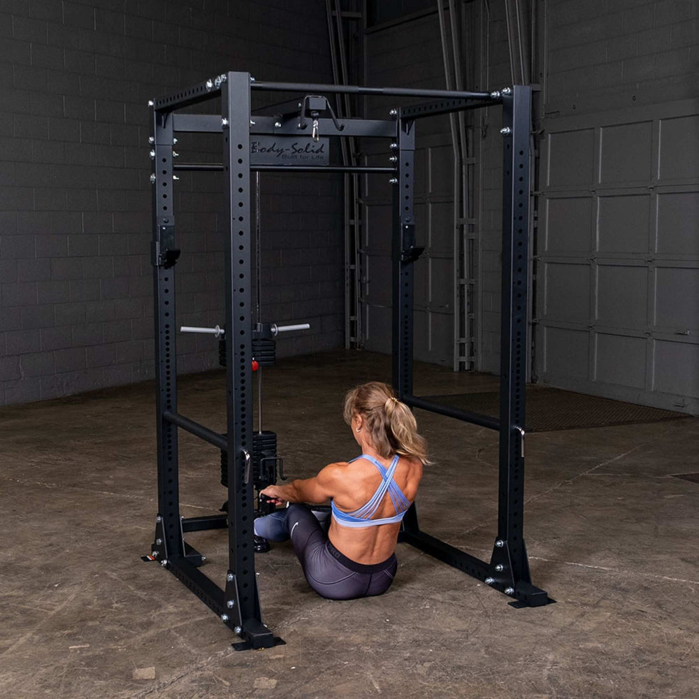 Body-Solid Power Rack Lat Attachment GLA400  a person using a lat down attachment 