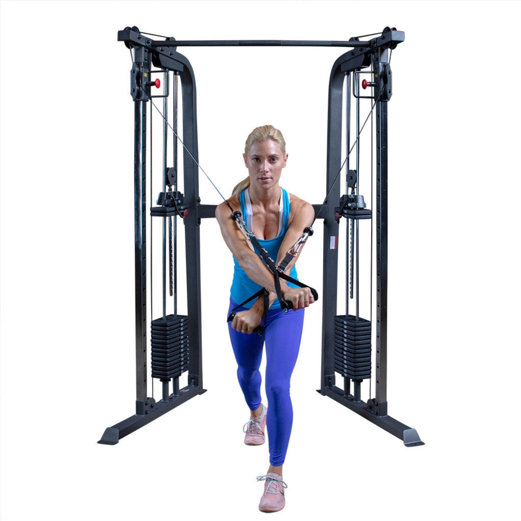 Body-Solid Powerline Functional Trainer PFT100 Woman performing a cable crossover exercise on a Powerline functional trainer machine