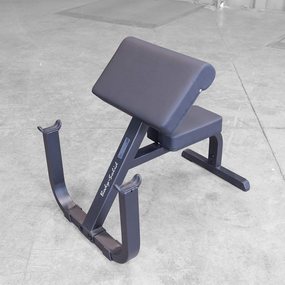 Body-Solid Preacher Curl Bench GPCB329B Overhead angled view of preacher curl bench positioned on a concrete floor