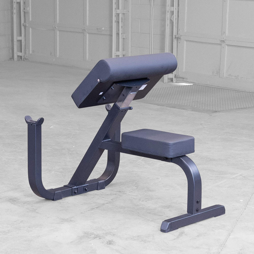 Body-Solid Preacher Curl Bench GPCB329B Rear angled view of the Body-Solid preacher curl bench showing padding and metal frame