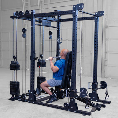 Body-Solid Pro ClubLine Functional Trainer Attachment SPRFTS Man performing seated lat pulldown exercise with straight bar on Body-Solid Pro ClubLine SPRFTS functional trainer.