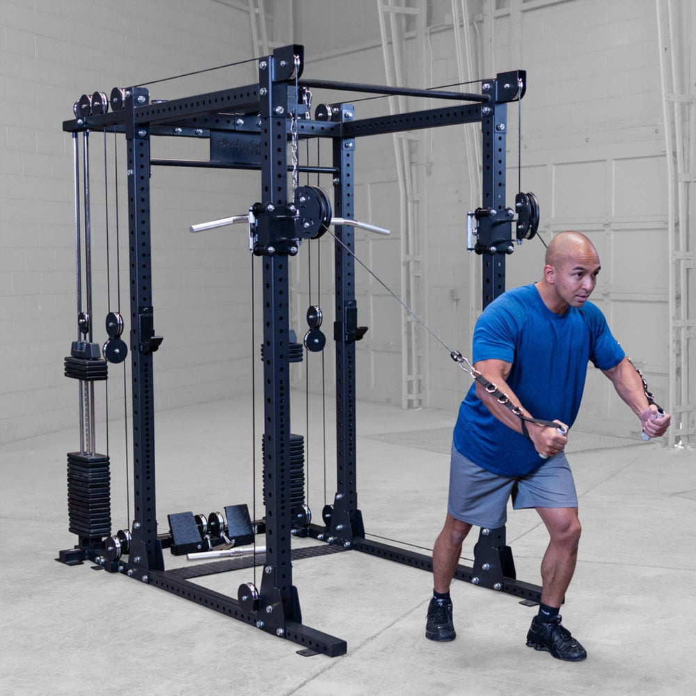 Body-Solid Pro ClubLine Functional Trainer Attachment SPRFTS Man performing standing cable chest fly using Body-Solid SPRFTS functional trainer attachment connected to power rack.

