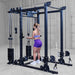 Body-Solid Pro ClubLine Functional Trainer Attachment SPRFTS Woman executing bent-over dual cable row using handles on Body-Solid Pro ClubLine SPRFTS power rack.
