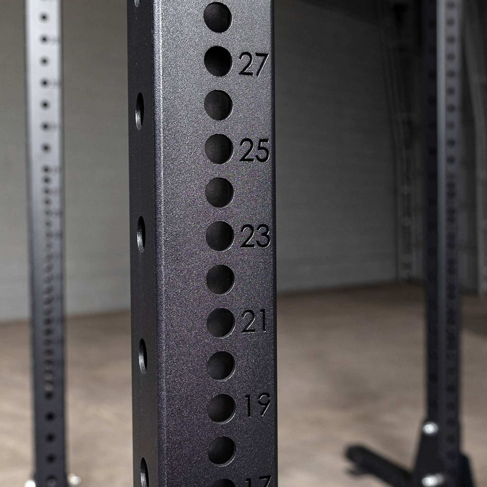 Body-Solid Pro ClubLine Half Rack with Rear Extension SPR500BACK Close-up of numbered adjustment holes on rack
