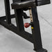 Body-Solid Pro ClubLine LVSP Leverage Shoulder Press LVSPB Detail shot of Body-Solid LVSP adjustable seat post featuring red adjustment knob and steel support column